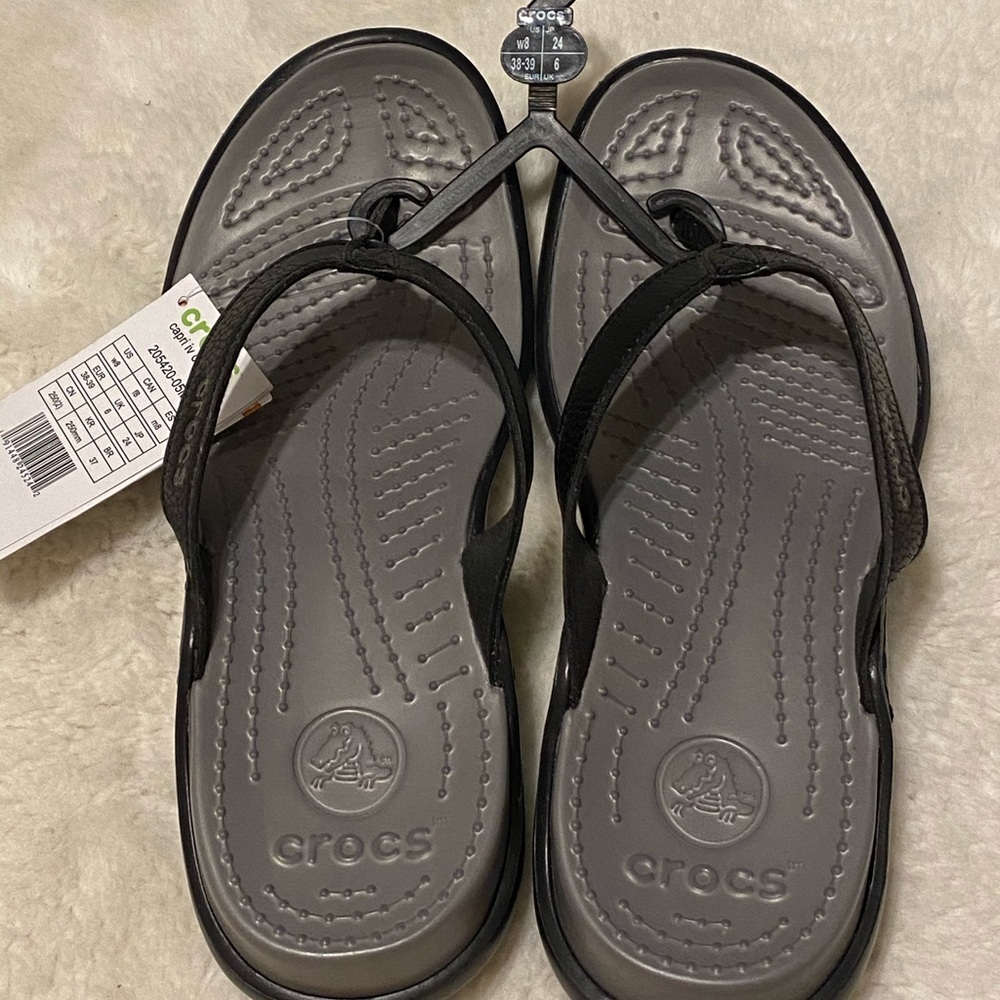 Grey croc flip flops